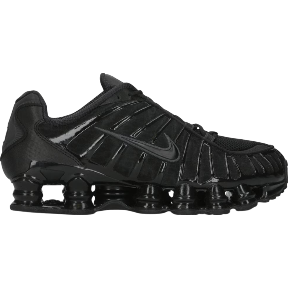 Nike Shox TL sneakers in Black Metallic Hematite — futuristic Nike design with full-length Shox columns and sleek metallic detailing.